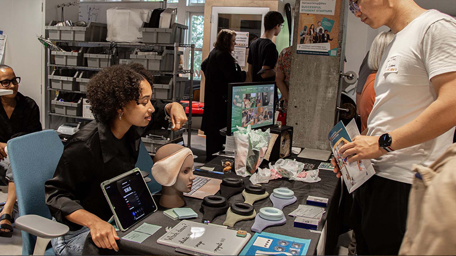 Prototyping Team Minji tabling at Demo Day.